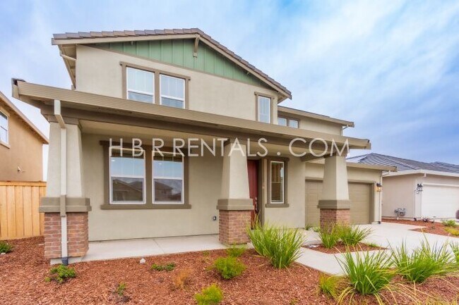 Building Photo - Charming 4-Bed, 3-Bath Home in Lathrop’s T...