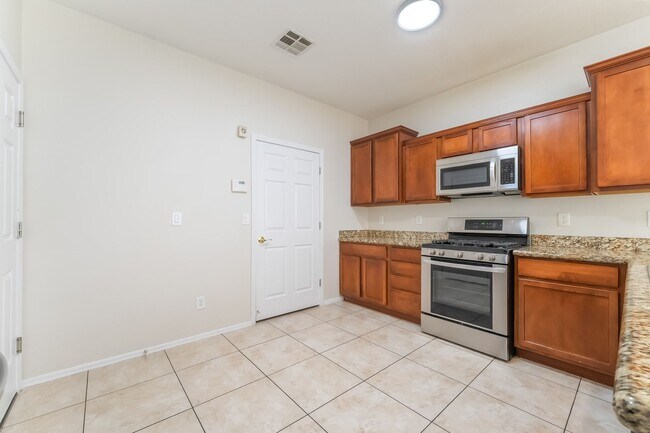 Building Photo - Gated Community  Home  Three Bedrooms, 2.5...