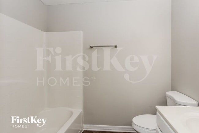 Building Photo - 6671 Gentle Oaks Dr N