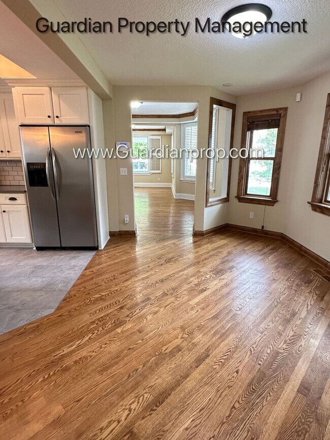 Building Photo - Downtown Hopkins SFH, Fenced Yard, Patio, Spacious Primary, 4 Car Detached Garage