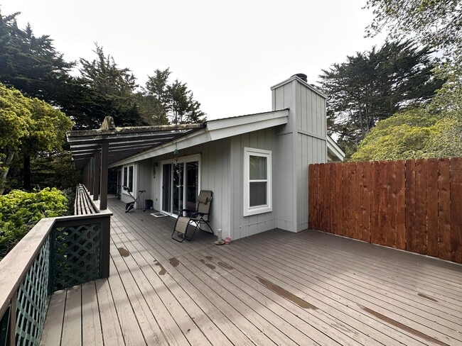 Building Photo - Sunny - Fully Furnished 2-Bedroom, with Office and 2 1/2 bathrooms.