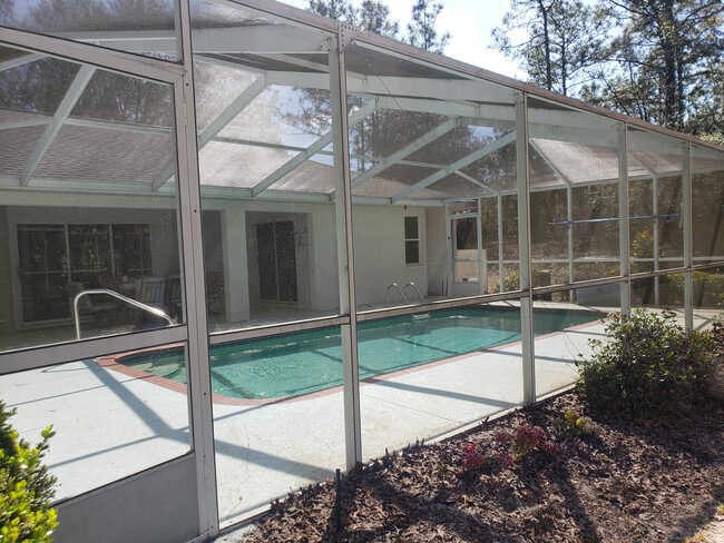 Building Photo - Lovely Pine Ridge Pool Home