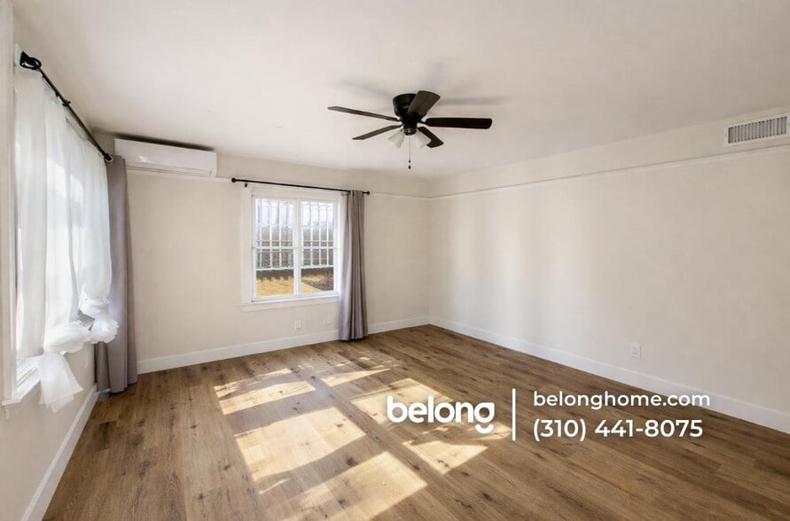 Building Photo - 1610 W 36th Pl