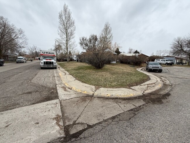 Building Photo - 4 Bedroom 2 Bathroom Home on Large Corner Lot with 2 Car Attached Garage In Great Neighborhood In...