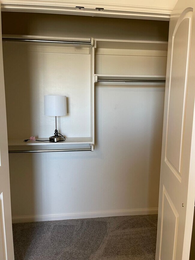 Building Photo - *Fully Furnished* 4 bedroom, 2.5 bathroom, 2 car garage Gated Neighborhood