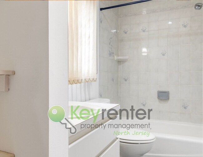 Building Photo - Spacious 2BR / 2.5BA Home with Huge Deck, Private Yard & Parking for 6