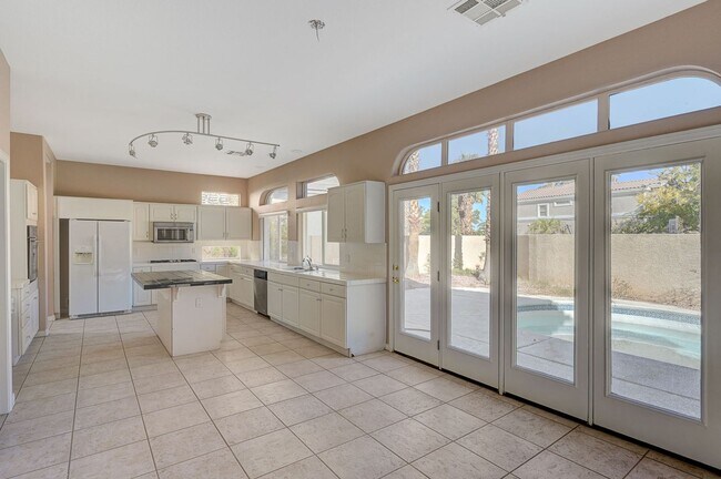 Building Photo - Stunning Green Valley home with a pool in guard gated Legacy