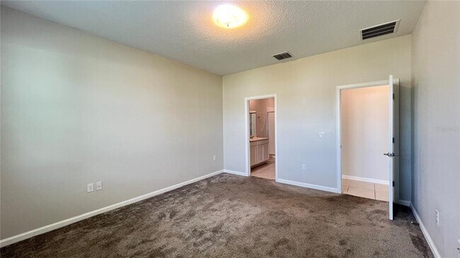 Building Photo - 16466 Glassy Loch Loop