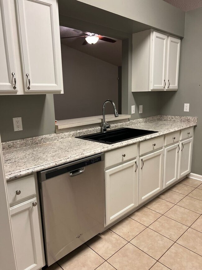 Building Photo - Four bedroom with a fenced in yard!