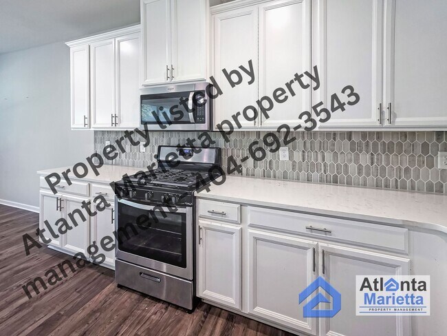 Building Photo - Spacious & Stylish 4BR/3.5BA Townhome Near...