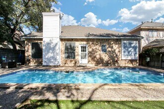 Building Photo - ***APPLICATION CURRENTLY UNDER REVIEW***Gated Lost Oaks Home with Private Pool & First-Floor Prim...