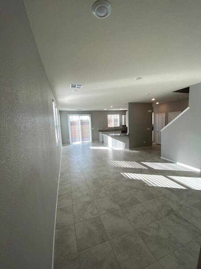Building Photo - Modern North Las Vegas Townhome with Granite Countertops, Covered Patio & Open-Concept Living