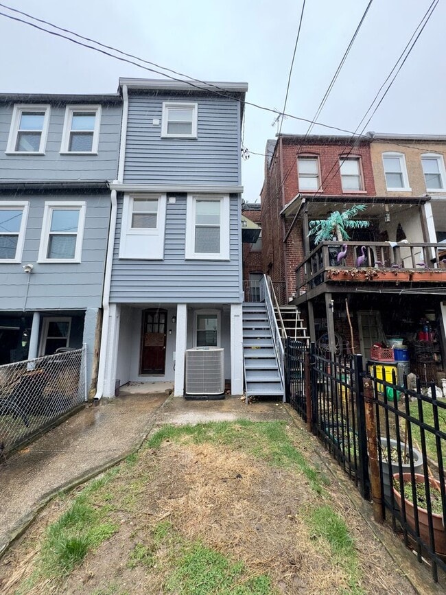 Building Photo - Spacious 4-Bedroom Townhome with Modern Amenities in Baltimore!