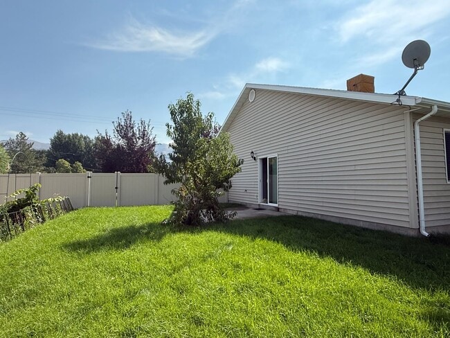 Building Photo - Beautiful patio home with 2 car garage and...