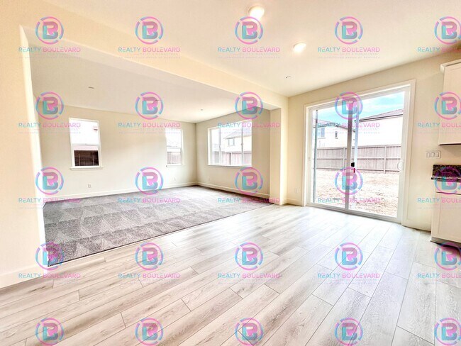 Building Photo - Modern Elegance: Stunning  New 4-Bedroom Home with Chef’s Kitchen & Dual Living Spaces