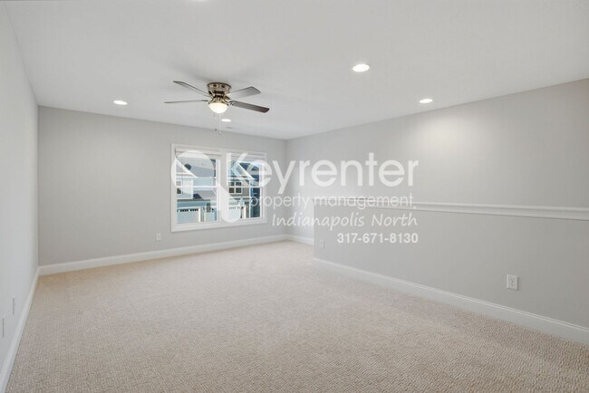 Building Photo - Located in Westfield, IN, this attractive 3-bedroom, 2.5-bath home sits on a corner lot within an...