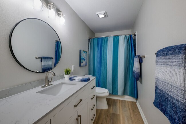 Building Photo - Patio Living with Basketball Court