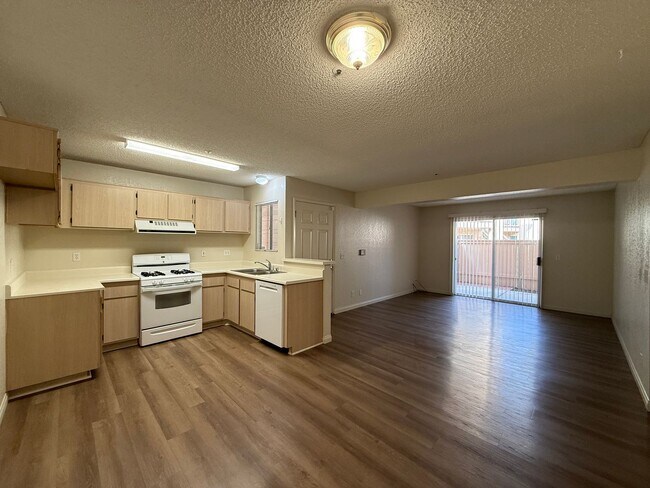 Building Photo - Downstairs Corner Condo in the Gated Commu...