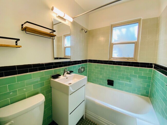 Building Photo - Charming 1 Bedroom North Park Apartment! Assigned Garage! Patio! In Unit Wash/Dryer!