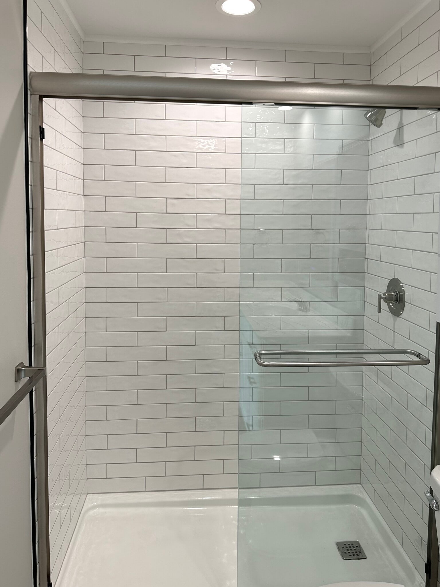 Subway tiled walk-in shower, spa door - 2217 Kenwood Blvd SE