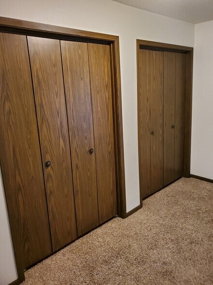 Closets on landing upstairs - 1106 Oleson Rd