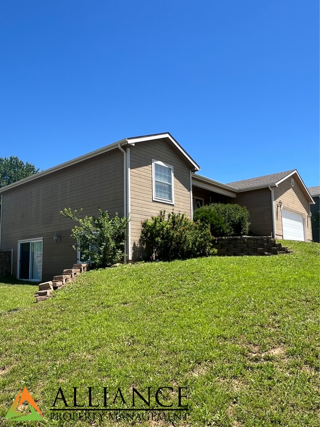 Building Photo - NEWLY PAINTED! Walk Out Basement & Much, Much More!