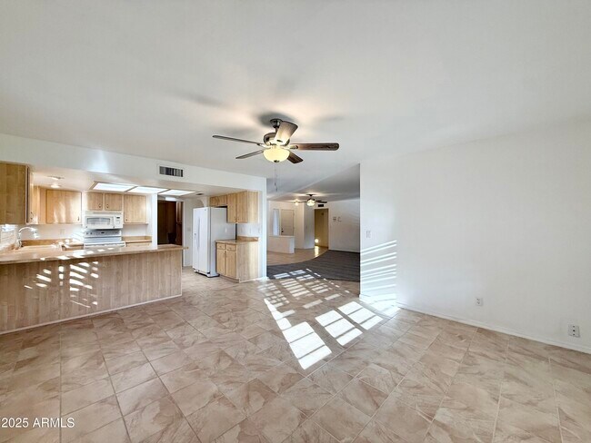 Building Photo - 7641 E Pueblo Ave