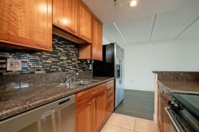 Building Photo - 50% Off First Month's Rent! Stellar Symphony Terrace Condo!