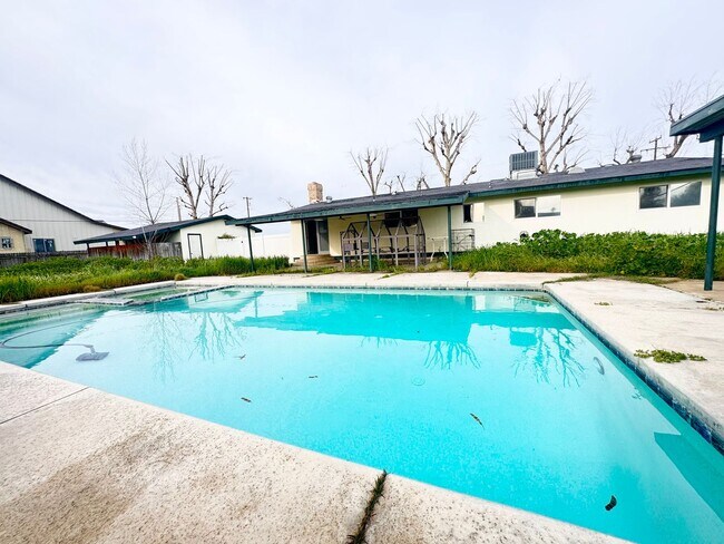 Building Photo - Available Now - Beautiful Ranch-Style Home with Pool