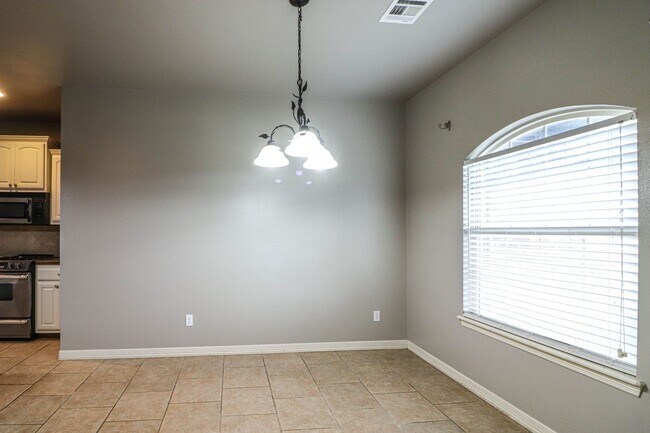 Building Photo - New vinyl plank in bedrooms, hall, new paint, new heat & air conditioning system 2025, large livi...