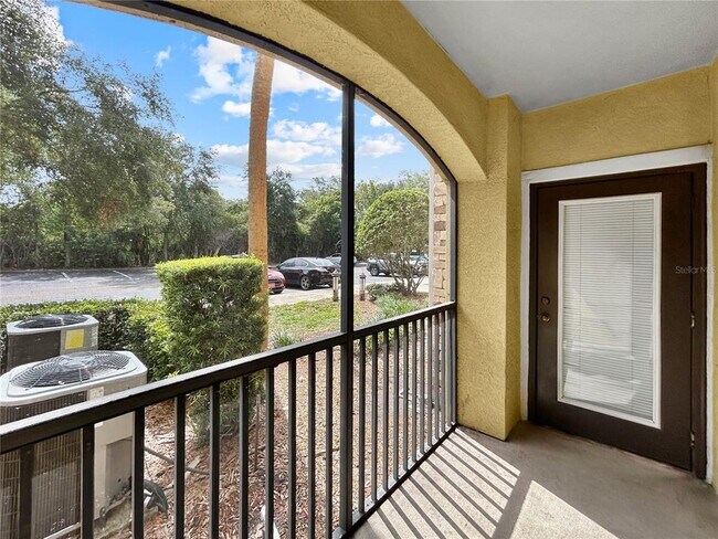 Building Photo - 10205 Courtney Palms Blvd
