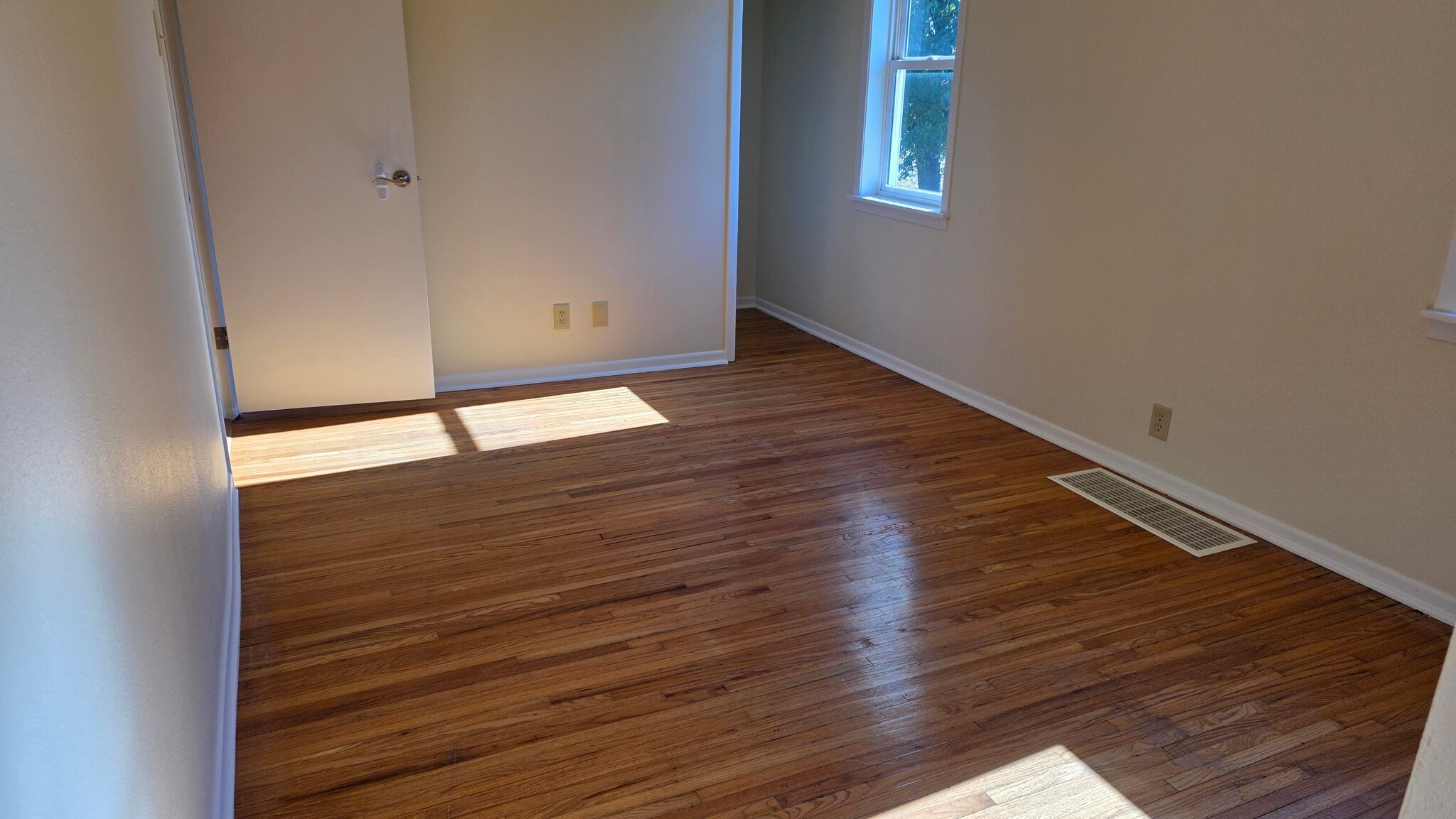 Bedroom 2, hardwood floor - 616 East St S