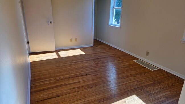 Bedroom 2, hardwood floor - 616 East St S