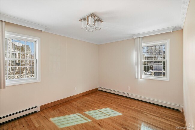 Building Photo - 214-27 38th Ave