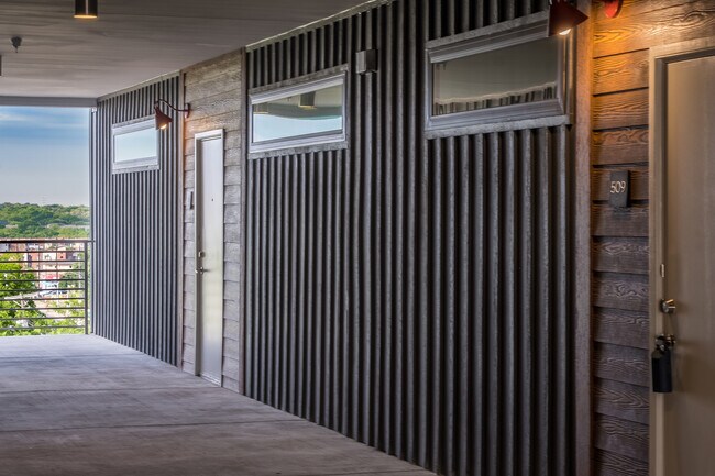 Building Photo - South Austin 2BR Condo with Balcony & Luxury Amenities