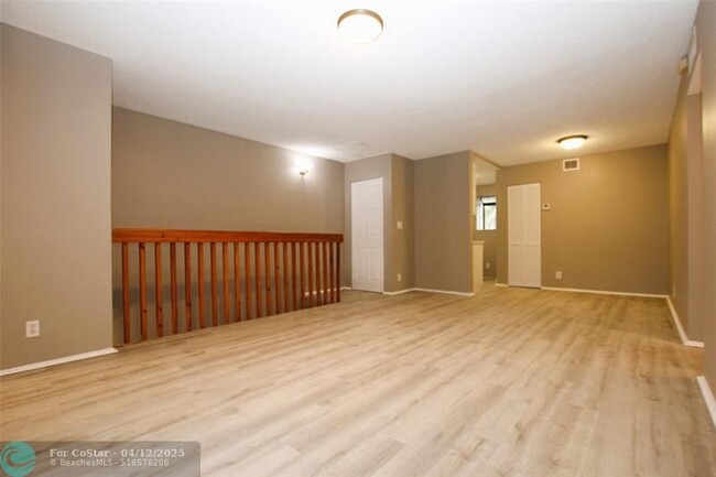 Building Photo - 704 Gardens Dr