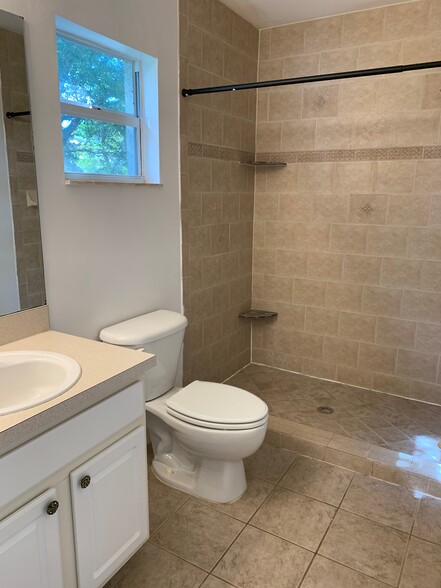 Step-in shower in the primary bedroom! - 10041 Poppy Hill Dr