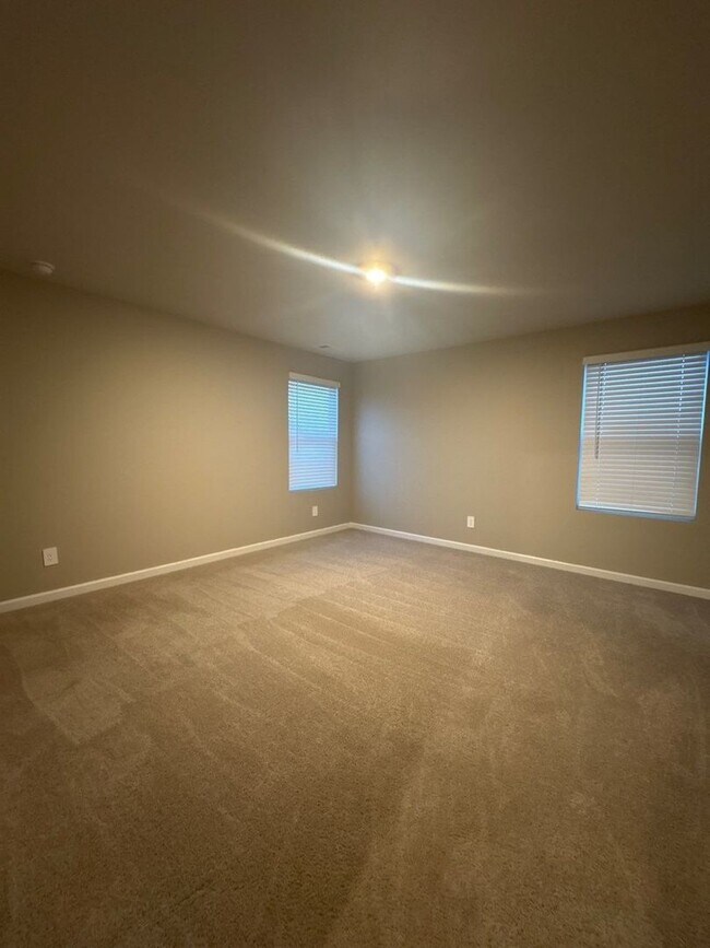 Building Photo - 4 Bedroom, 2.5 Bath and 2 Car Garage in Hartmann Crossing! $500 OFF FIRST MONTH’S RENT!