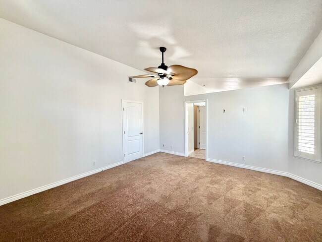 Building Photo - Open-Concept 3 Bedroom 2.5 Bathroom Home with Soaring Ceilings & Spacious Backyard
