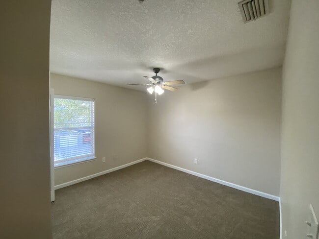 Building Photo - Beautifully Updated & Spacious 3BR/2BA Condo in a Secure Gated Community — Includes Cable, Intern...