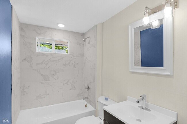 Building Photo - "Charming 3-Bed Duplex with Modern Comforts at 2235 MLK Jr Street, Indianapolis!"