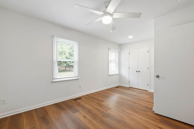 Building Photo - Rare Find: Updated and Modern End-Unit Tow...