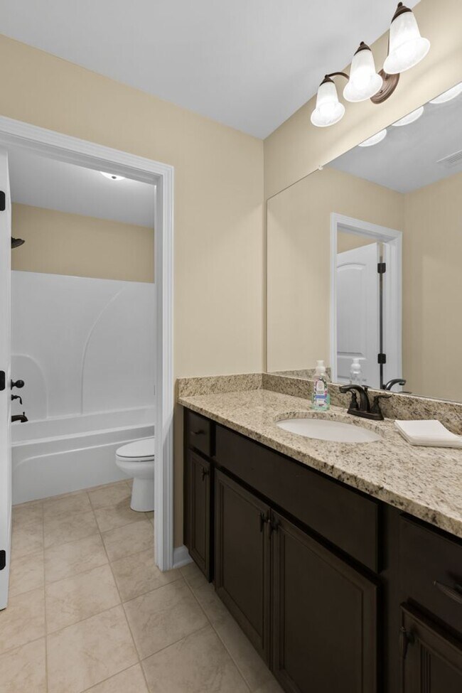 Building Photo - Spacious 5BR Home with Huge Fenced Backyard in The Reserve at Wyndham Gates!