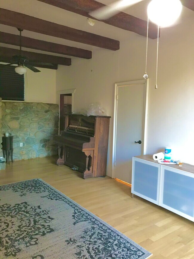Living room doors to bathroom/bedroom - 7964 Glenties Ln