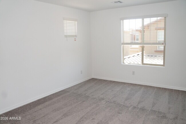 Building Photo - 3809 N 100th Dr