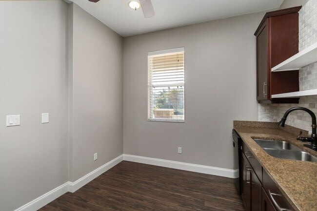 Building Photo - Beautiful Townhome with Private Courtyard & 2-Car Garage Near Lake Nona