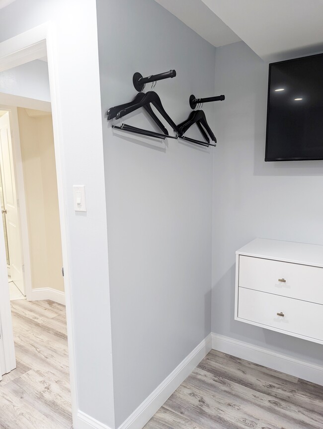 Bedroom dresser & hanging space + smart TV - 634 Rock Creek Church Rd NW