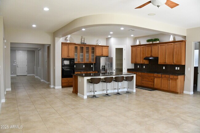 Building Photo - 9539 W Harmony Ln