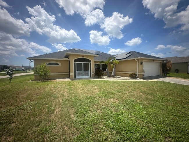 Primary Photo - 4 Bedroom plus Den - 2 Bathrooms - 2 Car G...