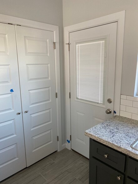 Integrated door blinds for improved light. - 413 Peabody Ave